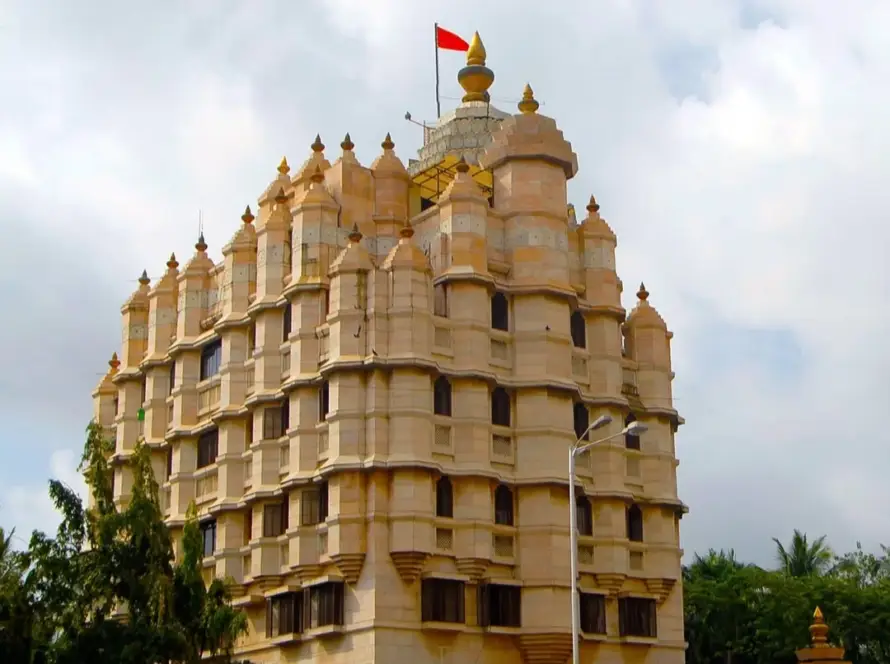 Temple sound system with discreet ceiling speakers carrying mantras through a marble prayer hall